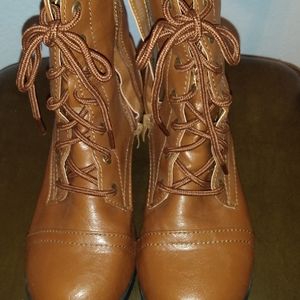 Leather boots a size 11 for a woman they are new